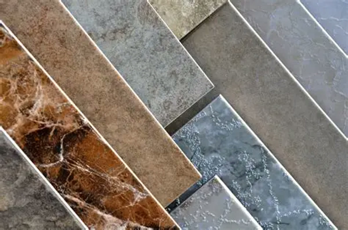 A selection of tile colours and finishes with a stone look.